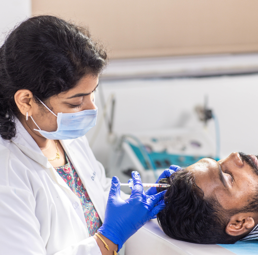 Dr. Radha Panumatsa showing the hair treatment process